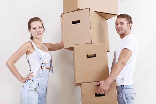 Professional movers handling furniture in a Marylebone apartment